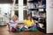 Child in school library. Kids reading books