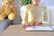 Child, schoolboy in yellow t-shirt, writes letters in notebook with an pencil, bright backlight, education concept, elementary