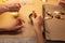 Child shaping and cutting baking cookies for christmas