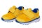 Child shoe fashion. Close-up of a pair of yellow blue child sneaker or sport shoes isolated on a white background. Elegant and