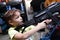 Child shooting a rifle