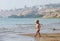 Child on the shore of lake Kinneret in the morning