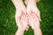 Child showing clean hands to her mother after washing - protective measures against coronavirus epidemy concept