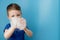 Child showing his hands with soap lather, cleaning and hygiene concept.Cleaning your hands frequently with water and soap will