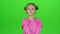 Child shows different emotions. Green screen. Slow motion