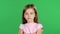 Child sighs heavily, she is tired. Green screen