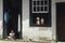 Child sitting at the door of his house in Tiradentes, Minas Gerais, Brazil.