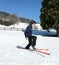 Child skiing falls with cross-country skis