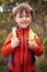 Child, smile and portrait for hiking and adventure for young and growing up for adolescent outdoor. Boy or kid with