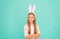 Child smiling play bunny role. Happy childhood. Traditions for kids to help get in easter spirit. Bunny ears accessory