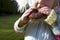 Child snacking on unhealthy chocolate donut