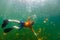 Child snorkeling in Jellyfish Lake