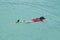 Child snorkelling in the blue laggon