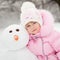 Child with snowman