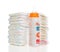 Child stack of diapers, nipple soother, baby feeding milk bottle