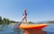 Child on a Stand Up Paddle board on a beautiful Mountain lake