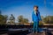 Child is standing back at the town fountain