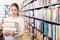 child standing in library