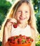 Child with strawberry