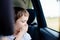 Child suffers from motion sickness in car