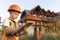 Child in a suit of an engineer is checking and inspecting the building or house before restoration, reconstruction or demolition.