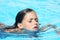 Child swimming breast stroke