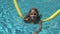 Child Swimming in Pool, Smiling Kid, Girl Portrait Enjoying Summer Vacation