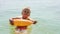 Child swims sea inflatable ring. danger of drowning Safety equipment, Child Life buoy