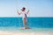 Child on swing. Kid swinging on beach