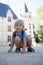 Child, toddler boy, playing on the premises of the Azay Le Rideau castle in Loire valley