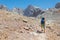 child travels in the mountains with a backpack. mountain hike in high mountains. Turkey