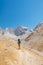 child travels in the mountains with a backpack. mountain hike in high mountains. Turkey