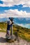 A child trying to see Alpine ranges and lake landscape. salzkammergut Austria