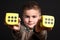 Child with two yellow dices