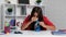 child using microscope to study at school, education