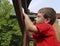 Child Using Telescope