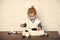 Child veterinarian examine toy animal with stethoscope