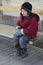 Child waiting at bus stop