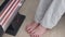 A child warms his feet at an electronic battery at home.