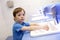 Child washing his hands