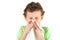 Child wiping his nose