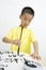 A child writing Chinese Calligraphy