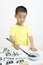 A child writing Chinese Calligraphy