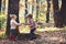 Childhood and child friendship, love and trust. Little boy and girl friends camping in woods. Kids activity and active