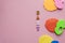 Childhood, love, care, hygiene, infants - The word baby laid out of colored wooden letters on a pastel pink background. large