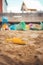 Childhood sandbox concept: Close up of plastic toy shovel