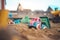 Childhood sandbox concept: Close up of plastic toy truck