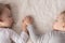 Childhood, sleep, relaxation, family, lifestyle concept - two young children 2 and 3 years old dressed in white and