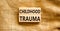 Childhood trauma symbol. Concept words Childhood trauma on beautiful wooden blocks. Beautiful canvas table canvas background.