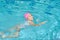 Children activities on nice swimming pool